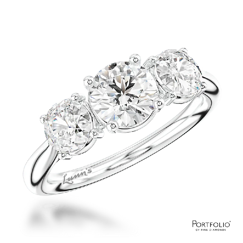 fashion-forward rings for women -Three Stone 0.70ct E SI1 Diamond Platinum Ring