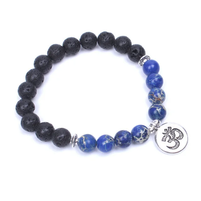 contemporary bangles for women -Calming Lava Stone Om Charm Bracelet