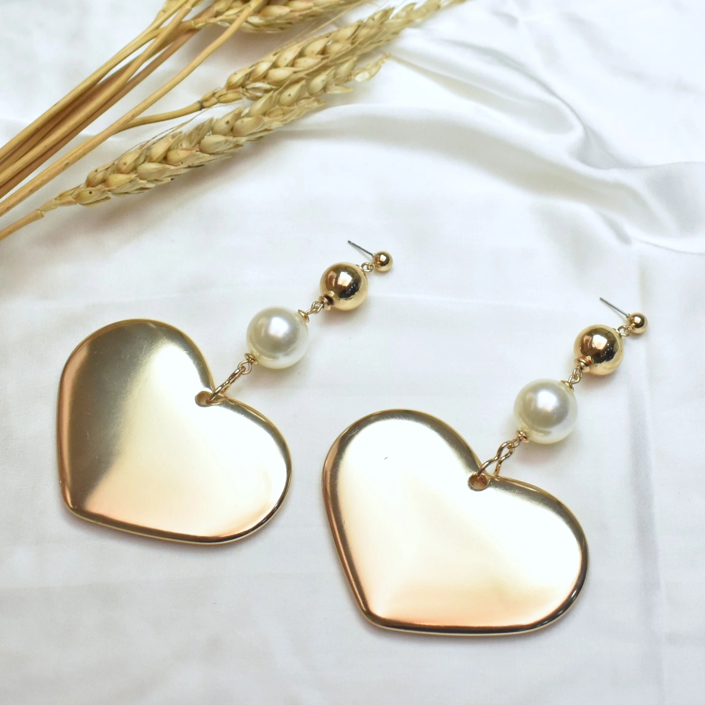 trendy earrings for women -TFC Heart Of Luxury Gold Plated Dangler Earrings